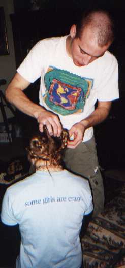 Joey braiding Annie's hair